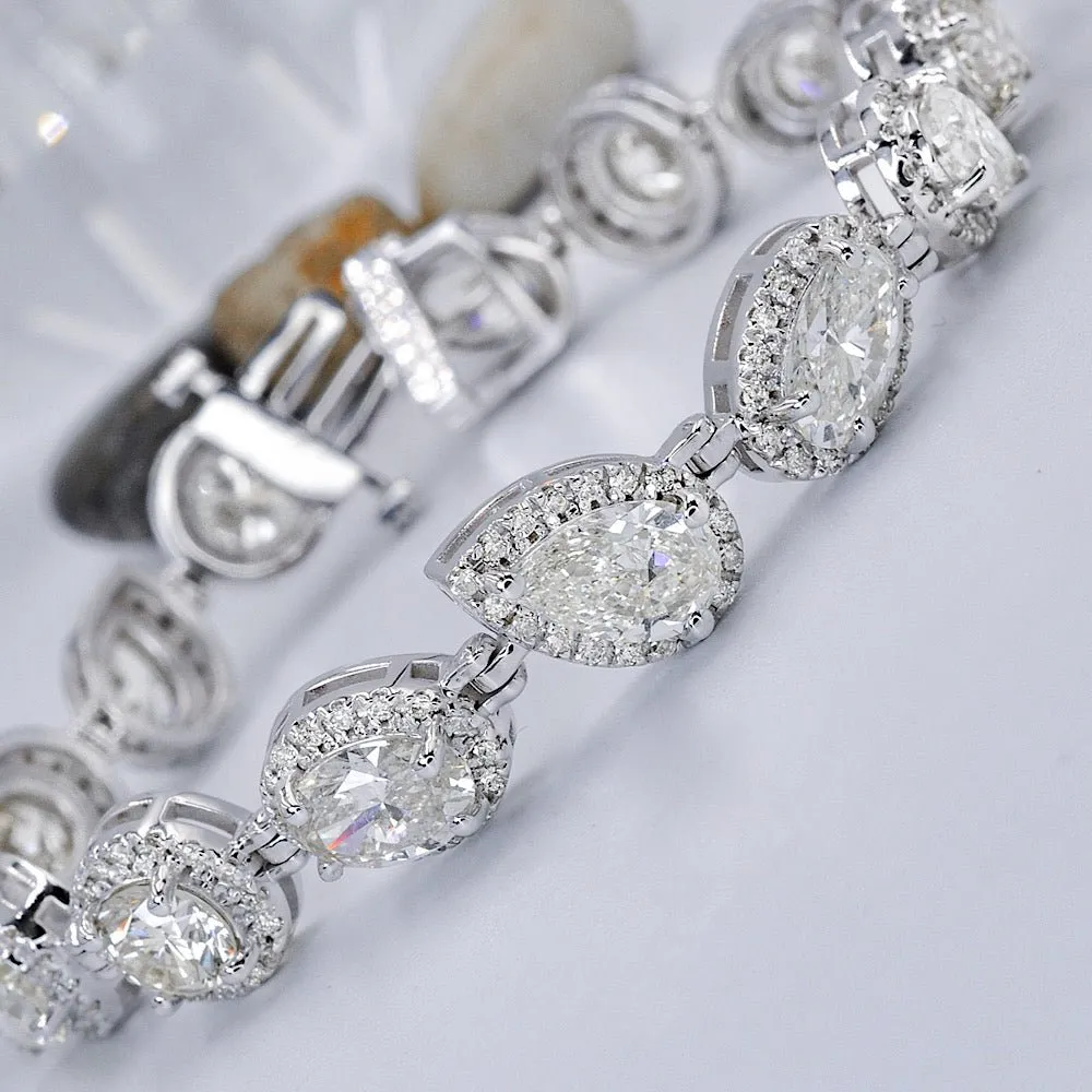 Certified 17.30CT Round, Pear, and Oval cut Diamond Bracelet in 18KT White Gold