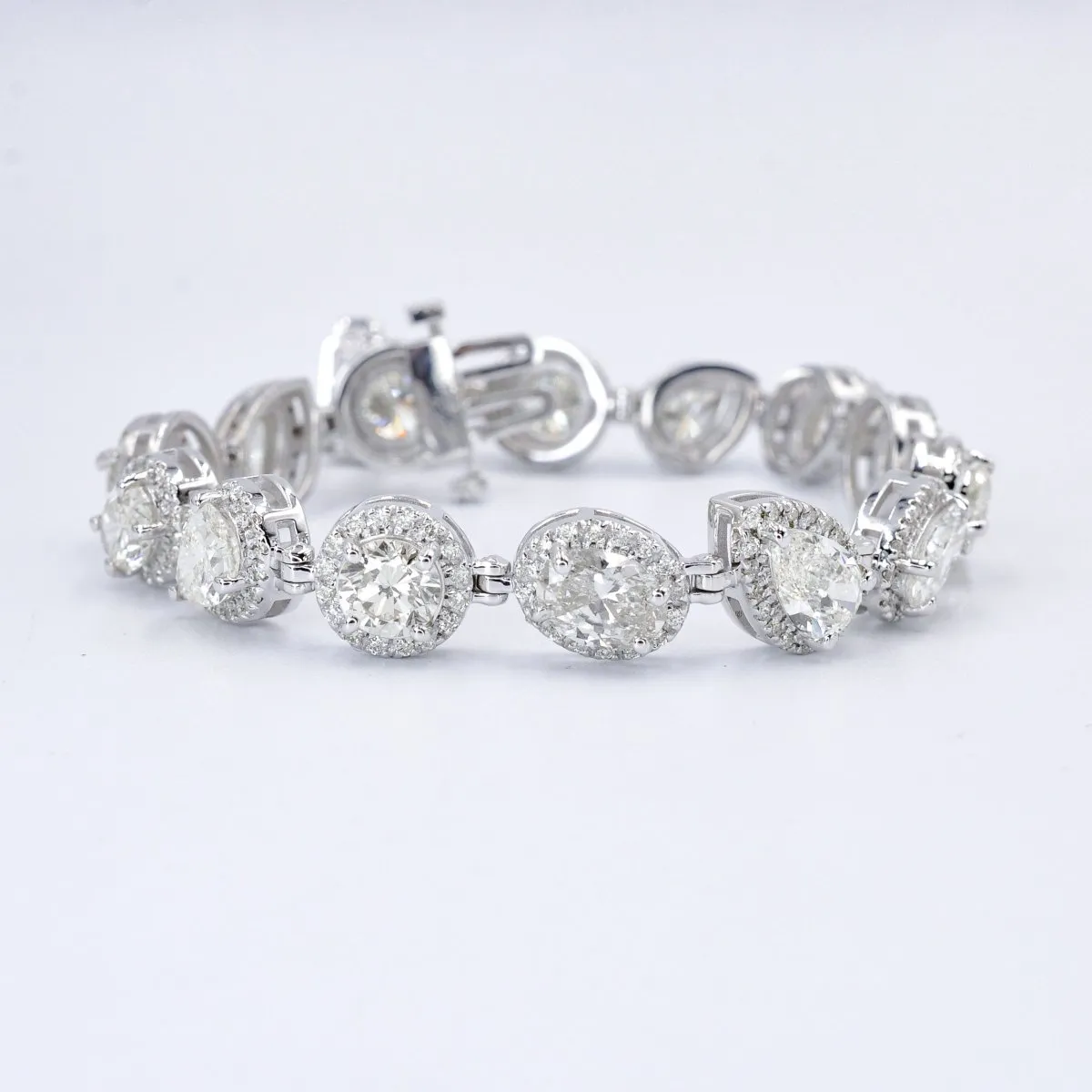 Certified 17.30CT Round, Pear, and Oval cut Diamond Bracelet in 18KT White Gold