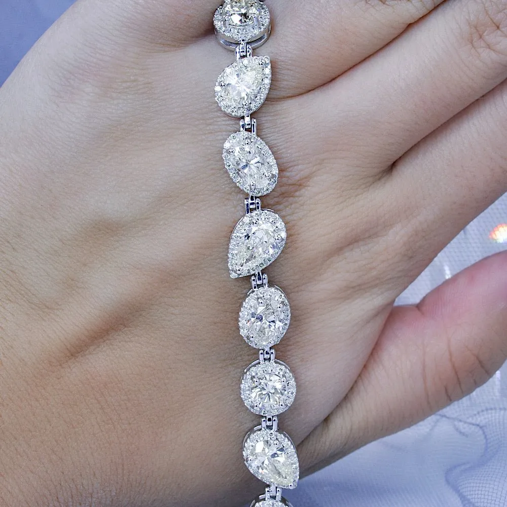 Certified 17.30CT Round, Pear, and Oval cut Diamond Bracelet in 18KT White Gold